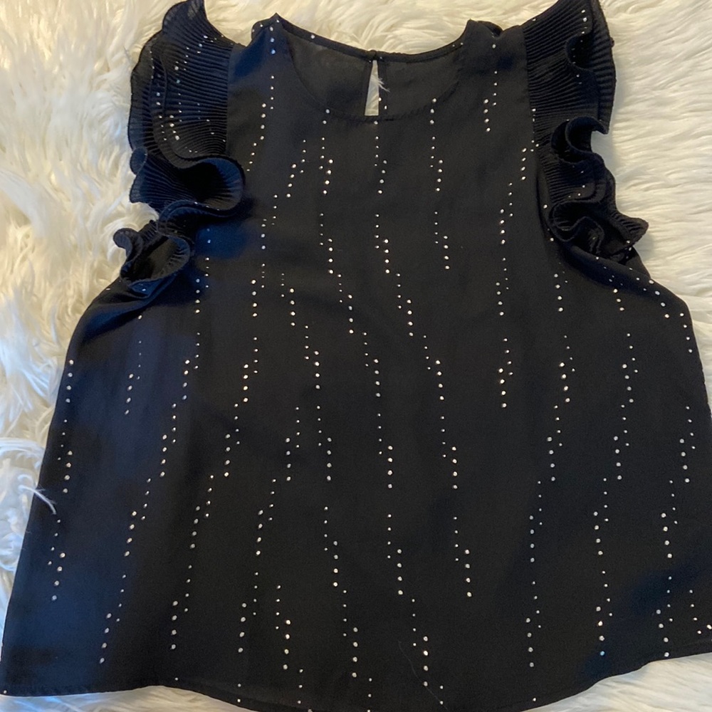 Women Shirt no size on shirt bust 34” long 23”